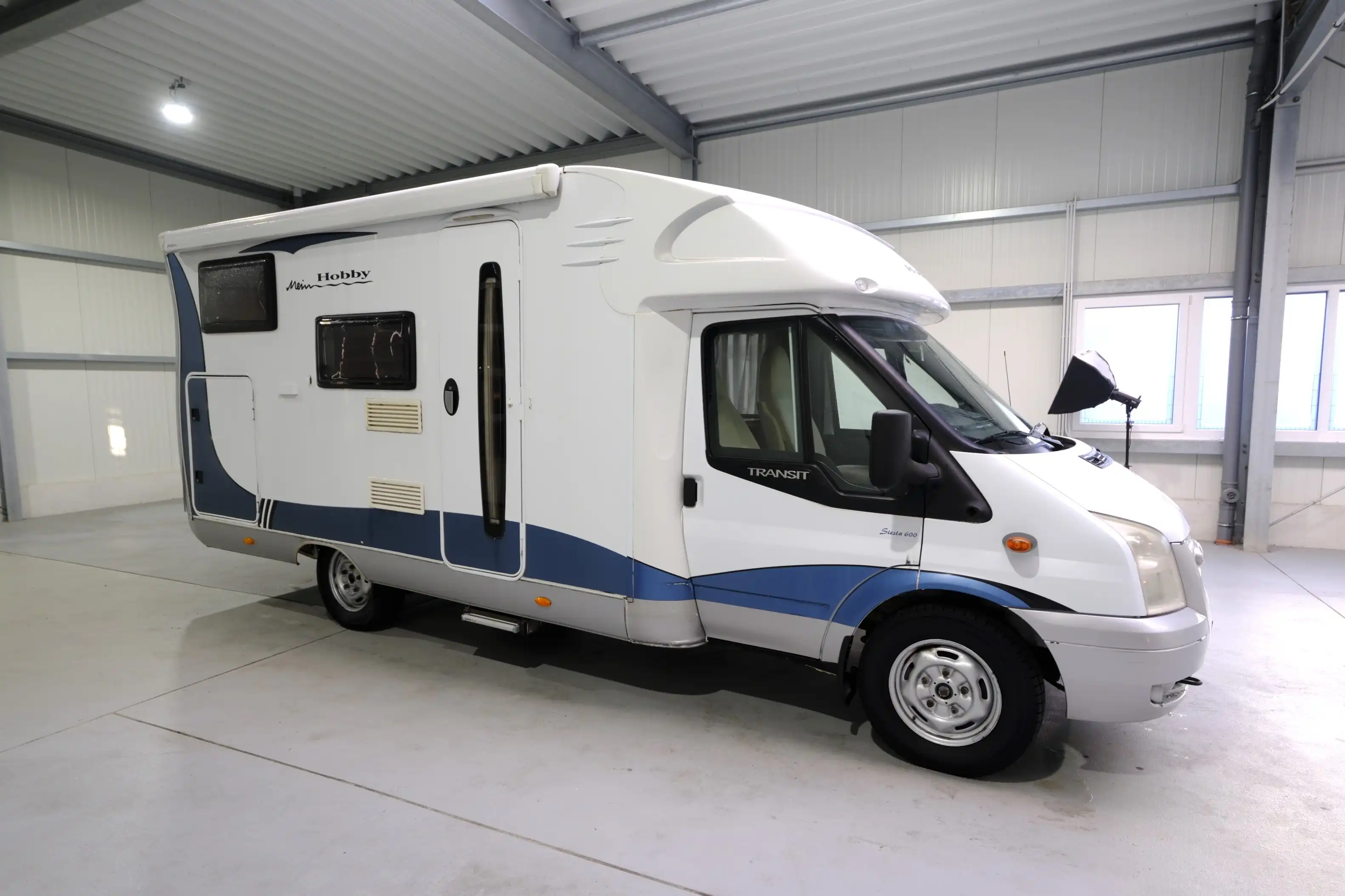 HOBBY Siesta T 600 GFLC/Festbett/Garage/Klima/Markise/TÜV 07-2026